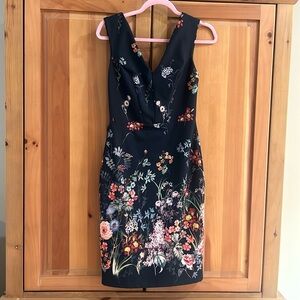 Gorgeous black floral Suzy Shier fitted dress.  Worn once. EUC like new. Size XS